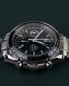 Omega Speedmaster Day-Date 3520.50 - onderaanzicht met de gegroefde kroon en twee drukknoppen onderaan de kast