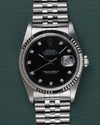 Rolex Datejust 16234 Black Diamond Dial 1994 - Frontale close-up recht van voren met de zwarte wijzerplaat en diamanten uurmarkeringen scherp in beeld