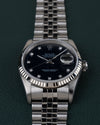 Rolex Datejust 16234 Black Diamond Dial 1994 - Frontaal aanzicht met de kroon rechts en de jubilee-band recht naar boven