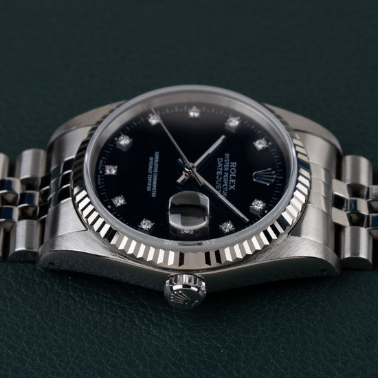 Rolex Datejust 16234 Black Diamond Dial 1994 - Frontaal aanzicht ondersteboven met de kroon onderaan de kast